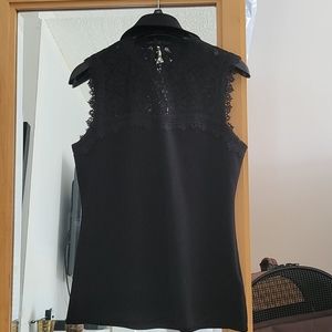 Black sleeve less blouse